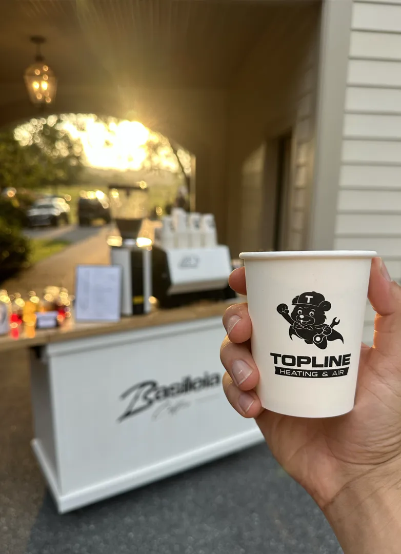 Professional coffee catering with a mobile espresso cart with branded cups.