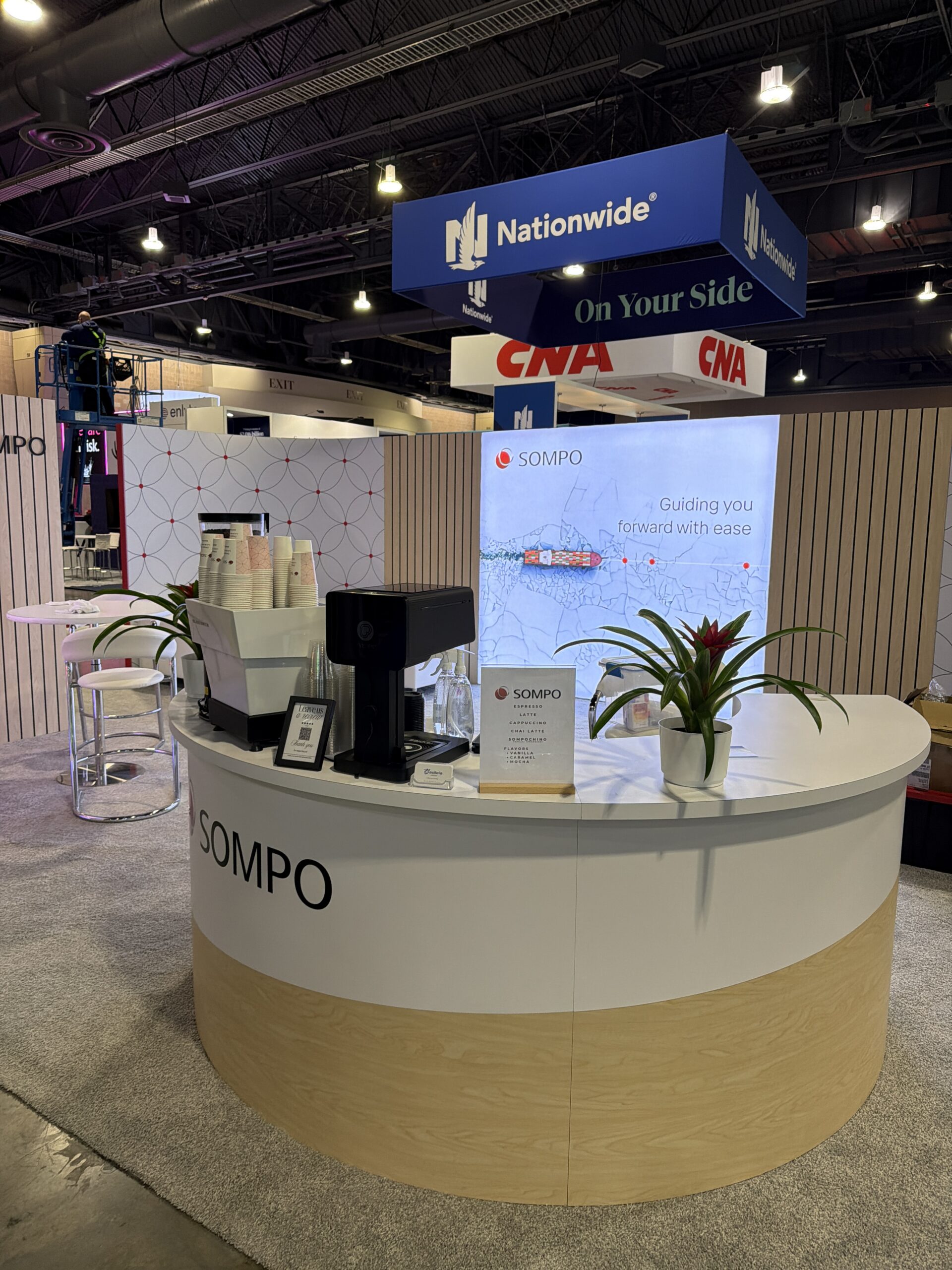 La Marzocco espresso machine with branded cups at RIMS RiskWorld Philadelphia
