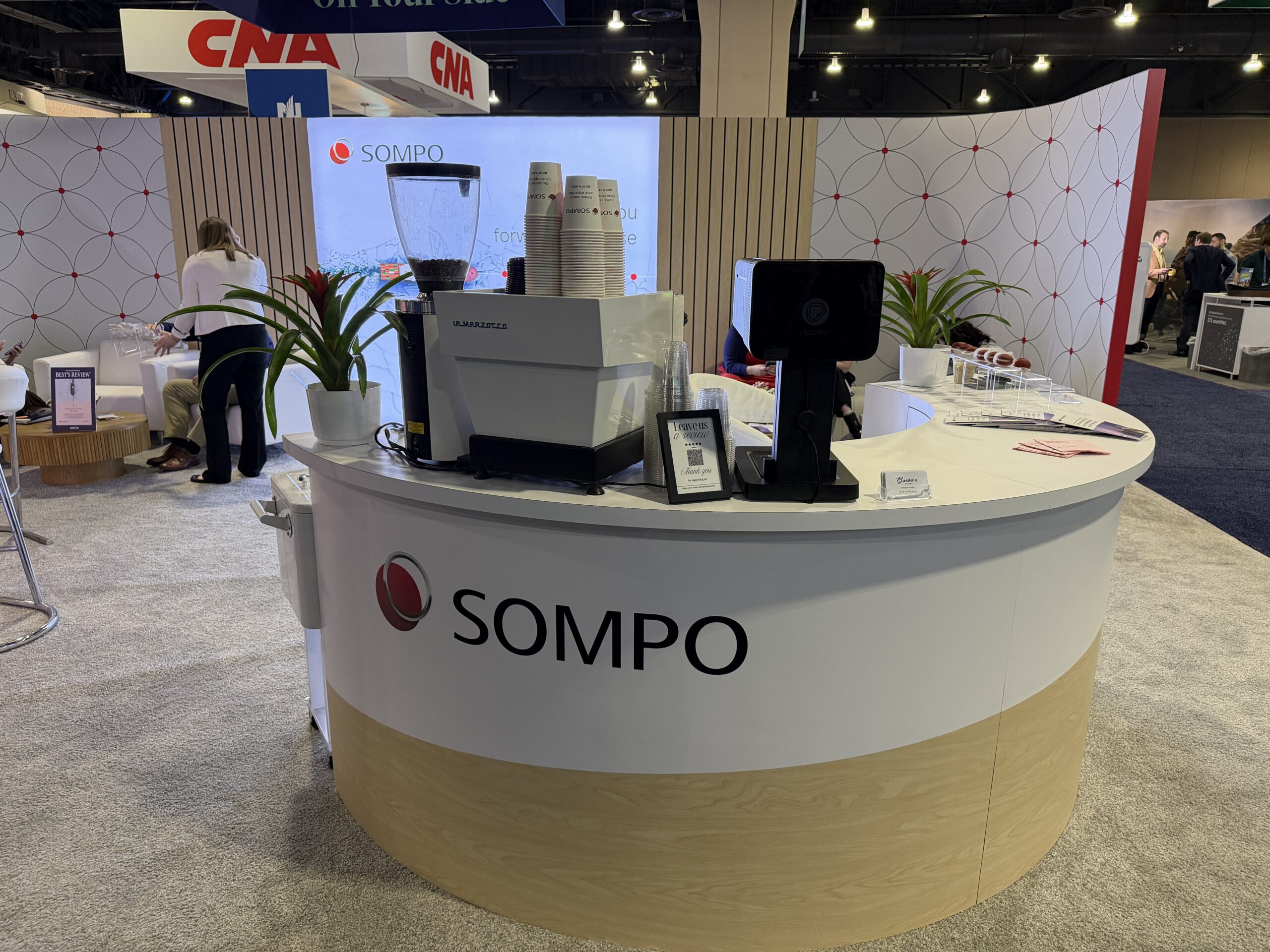 Branded espresso bar setup at insurance industry conference Philadelphia